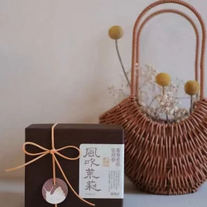 Wind-Blown Jasmine Phoenix Dancong Oolong Tea from Anjiao high-altitude tea estate, with rare old bush trees and jasmine fragrance.